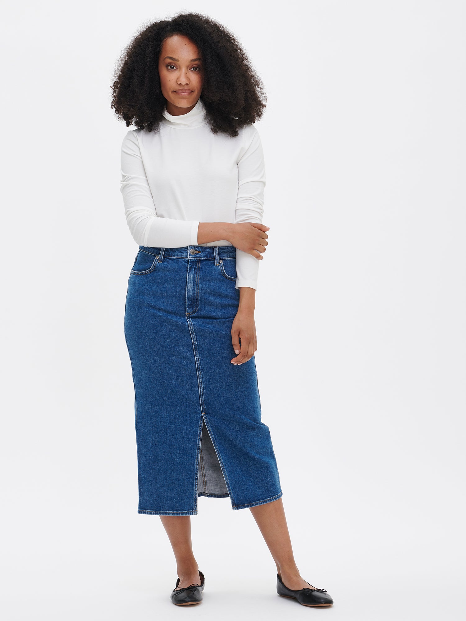 Women's Mari jersey turtleneck in off white with jeans skirt