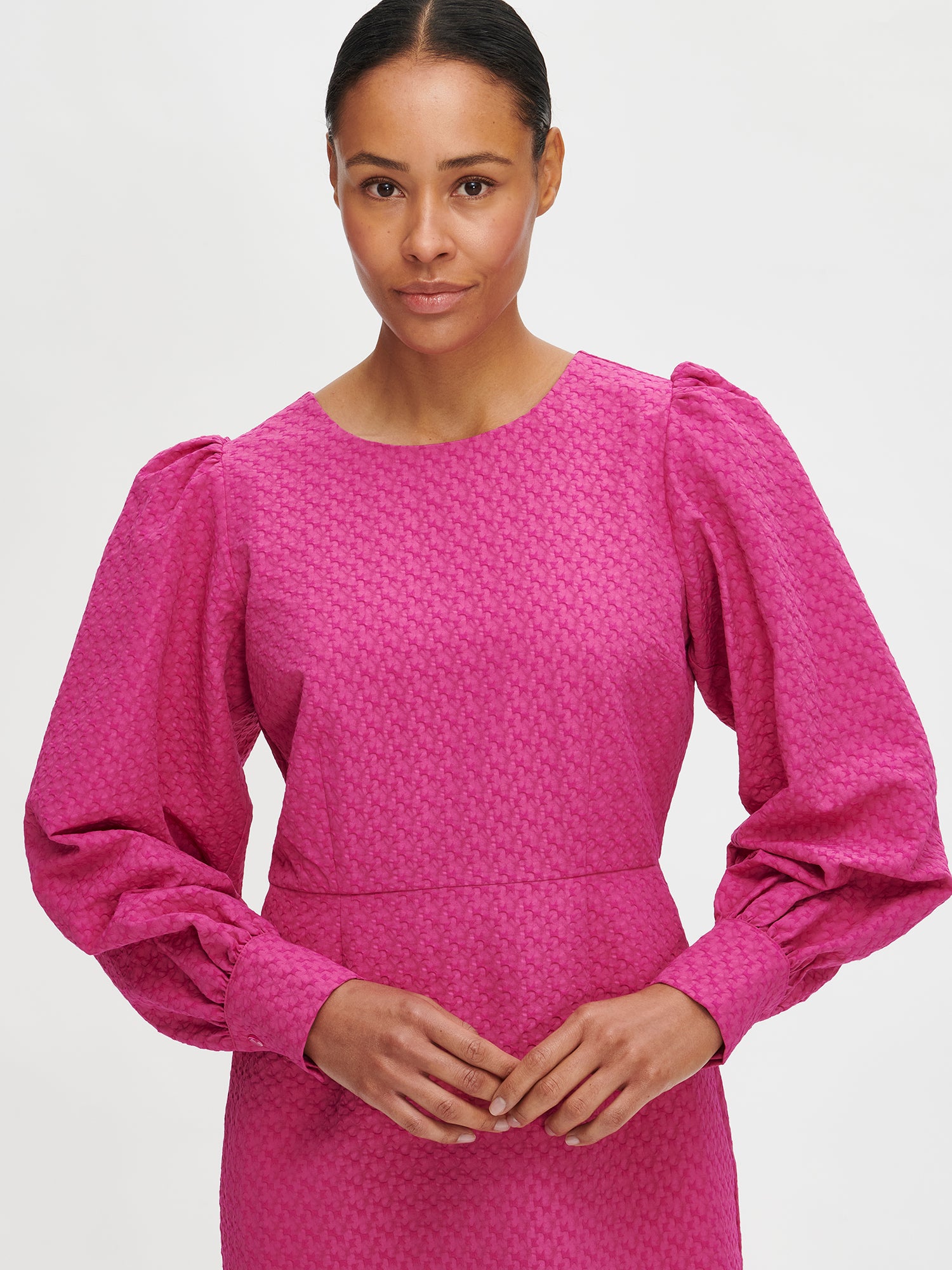Nanso's elegat pink Reliefi dress, close-up