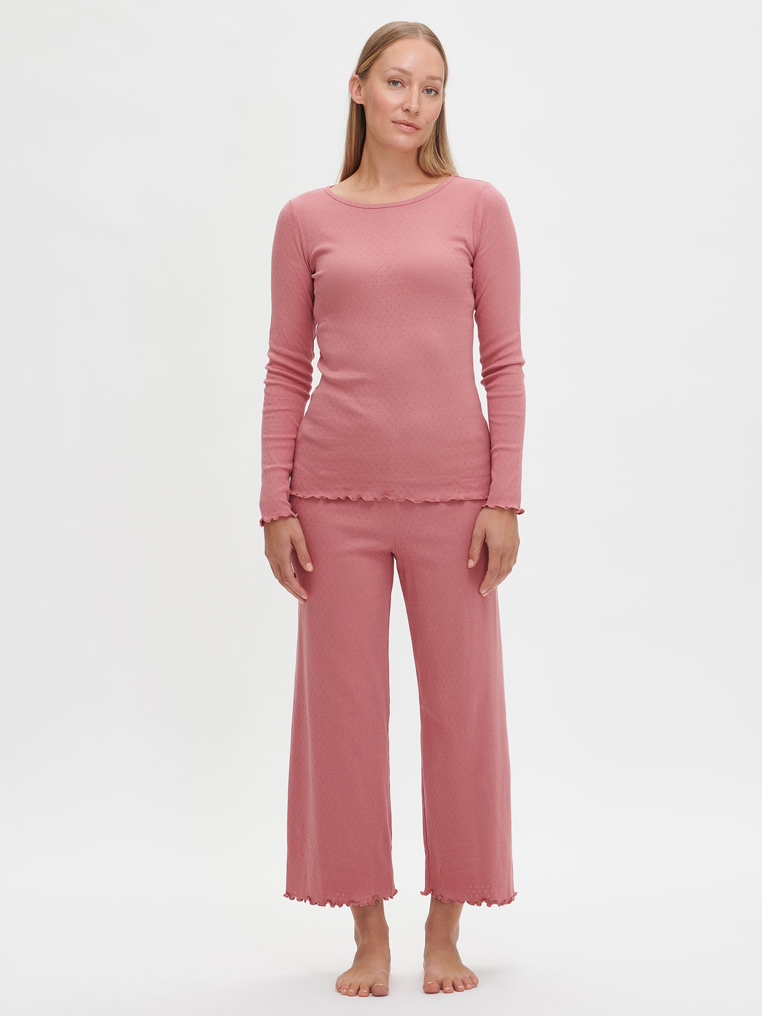 Nanso Women's Pink Elise Pants worn by the model.