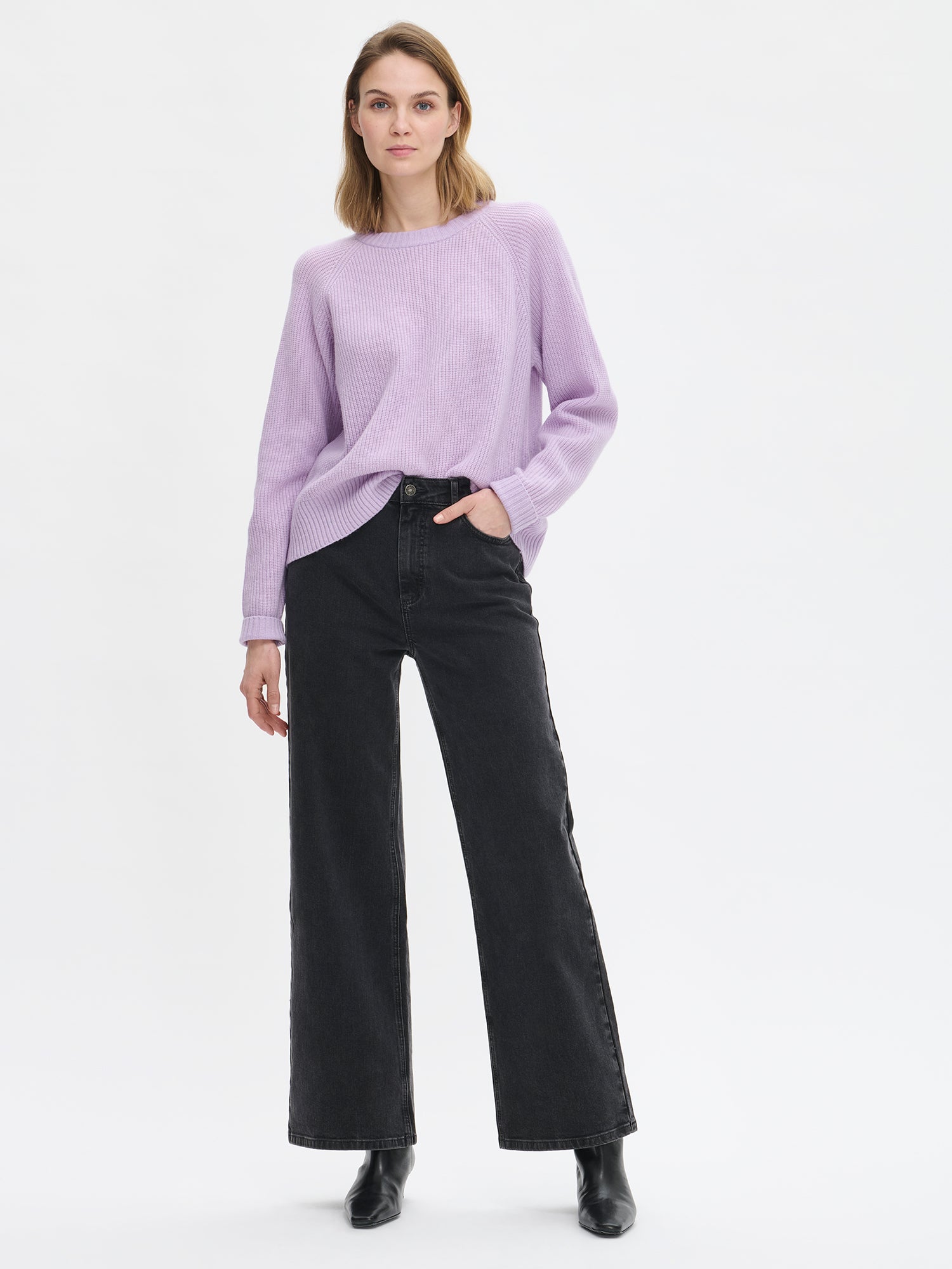 Nanso women's Pamela knit sweater in lilac with jeans