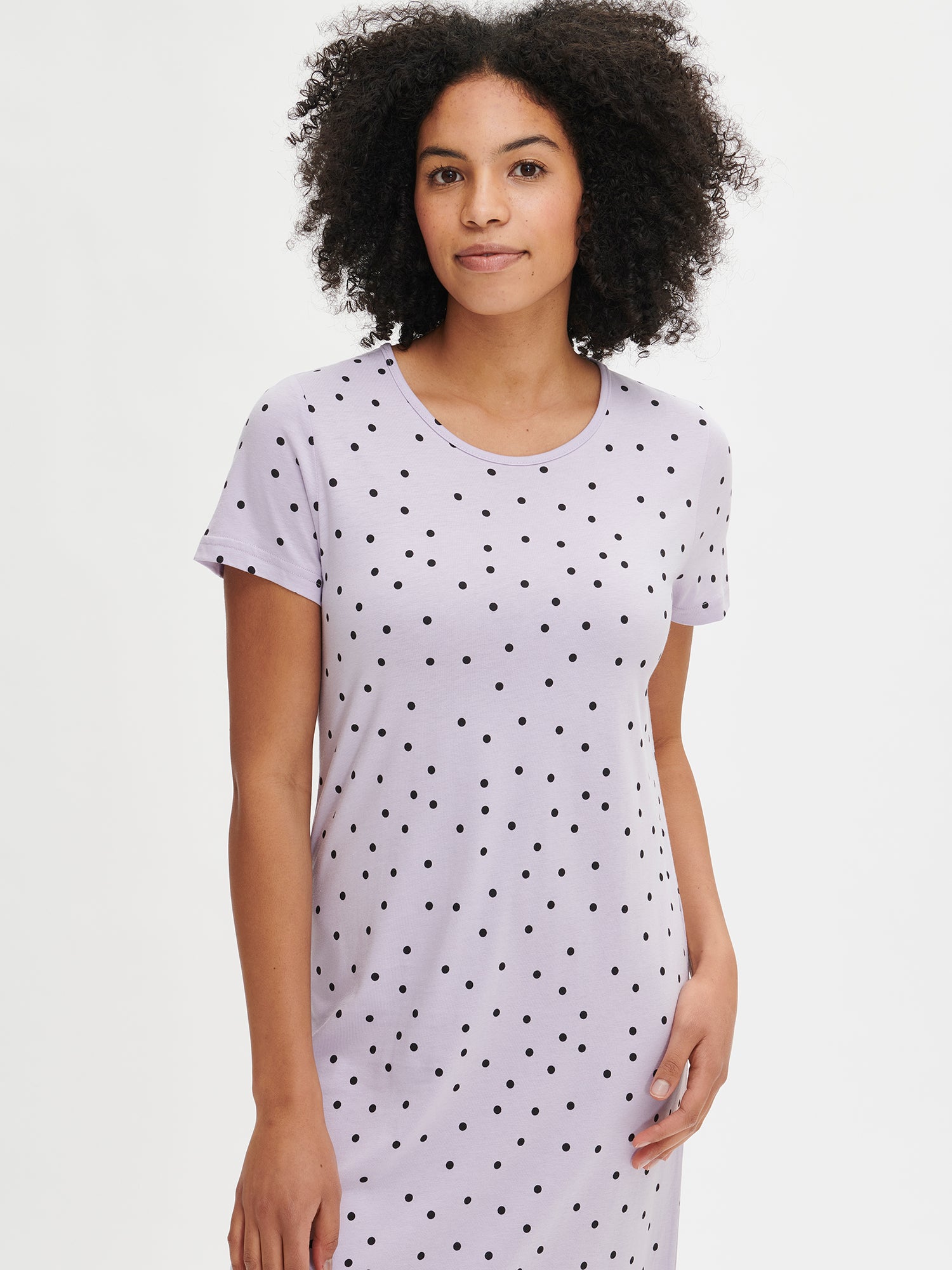 Nanso women's patterned violet Pallo nightdress with short sleeves and a round neckline, worn by the model in a close-up front view.