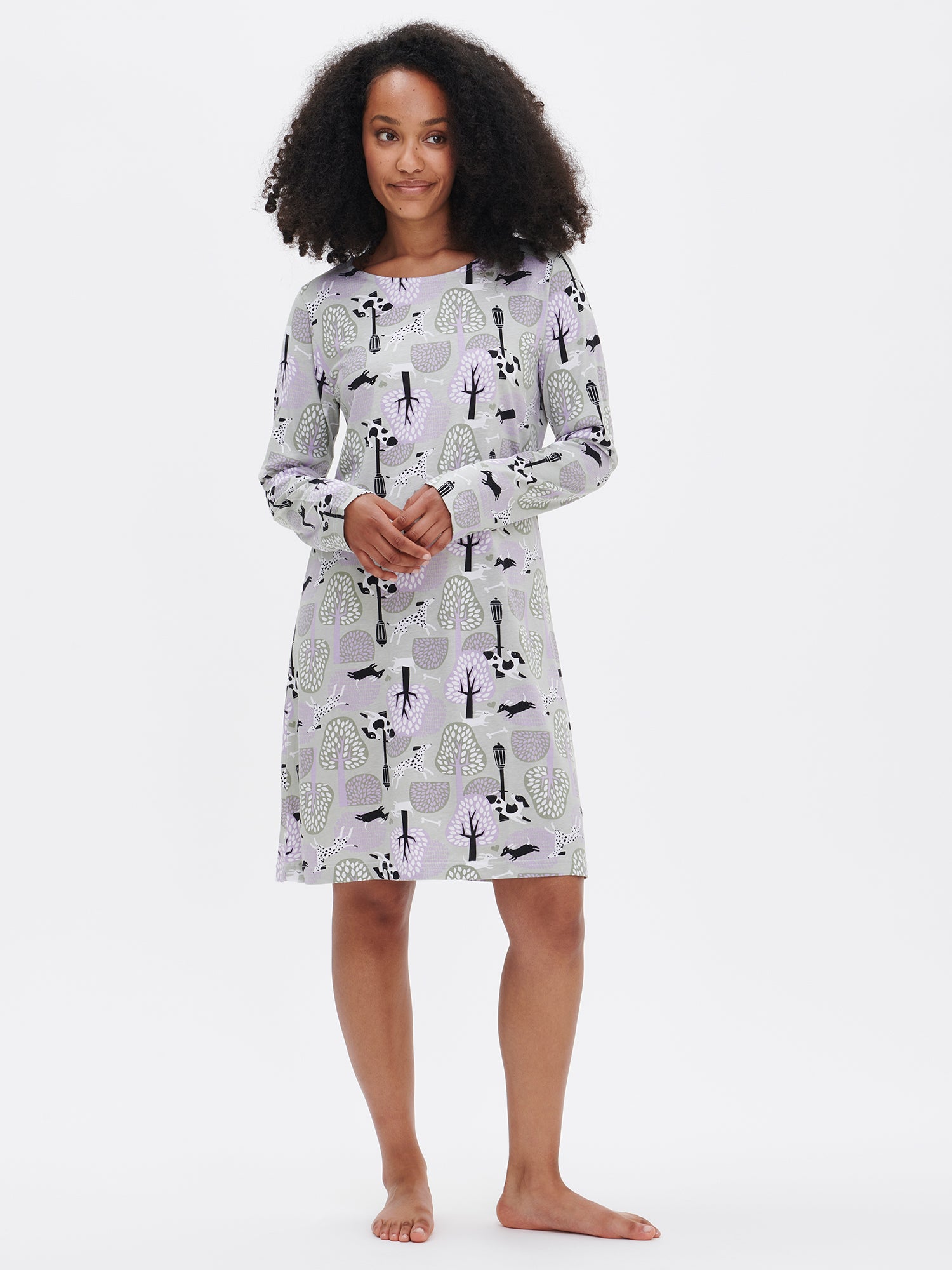 Nanson women's patterned green Luna nightdress with long sleeves and an oval neckline, worn by the model.