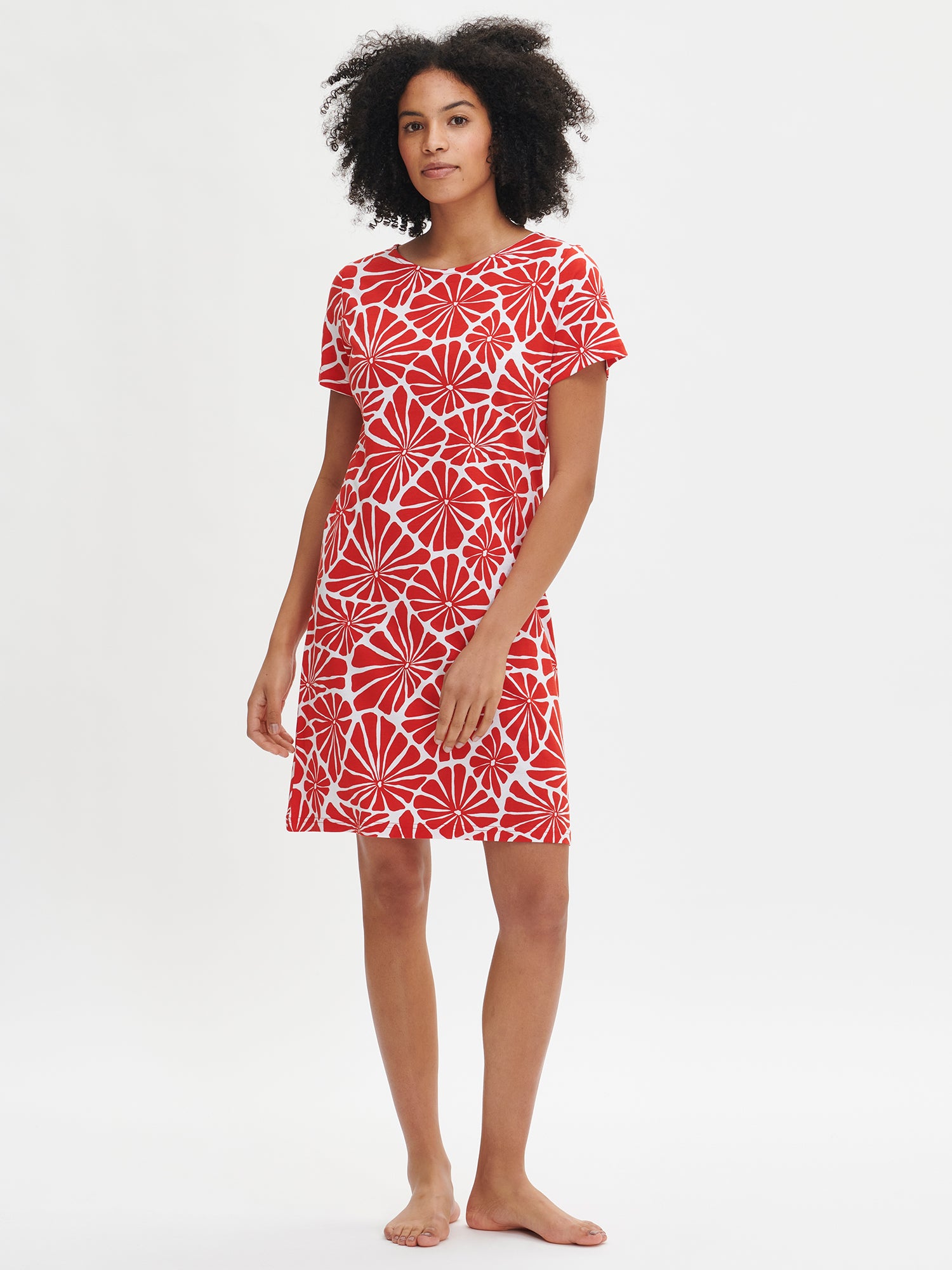 Nanson women's patterned red Aralia nightdress with short sleeves and an oval neckline, worn by the model.