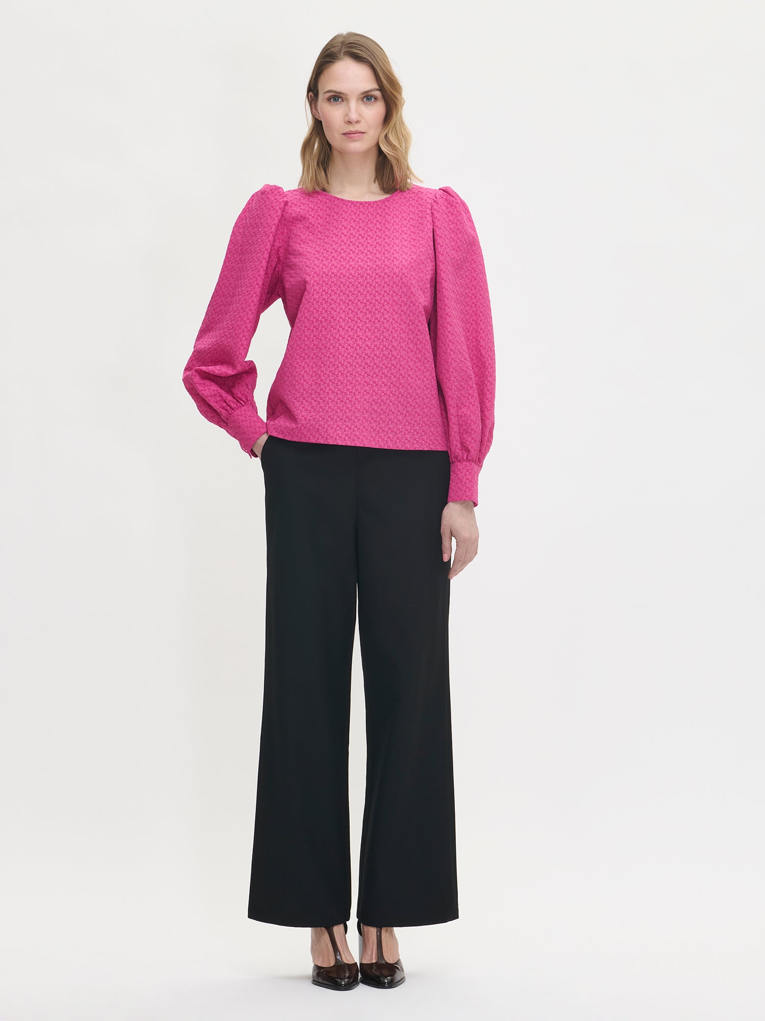 Nanso's stylish women's blouse in pink features a beautiful textured surface, front