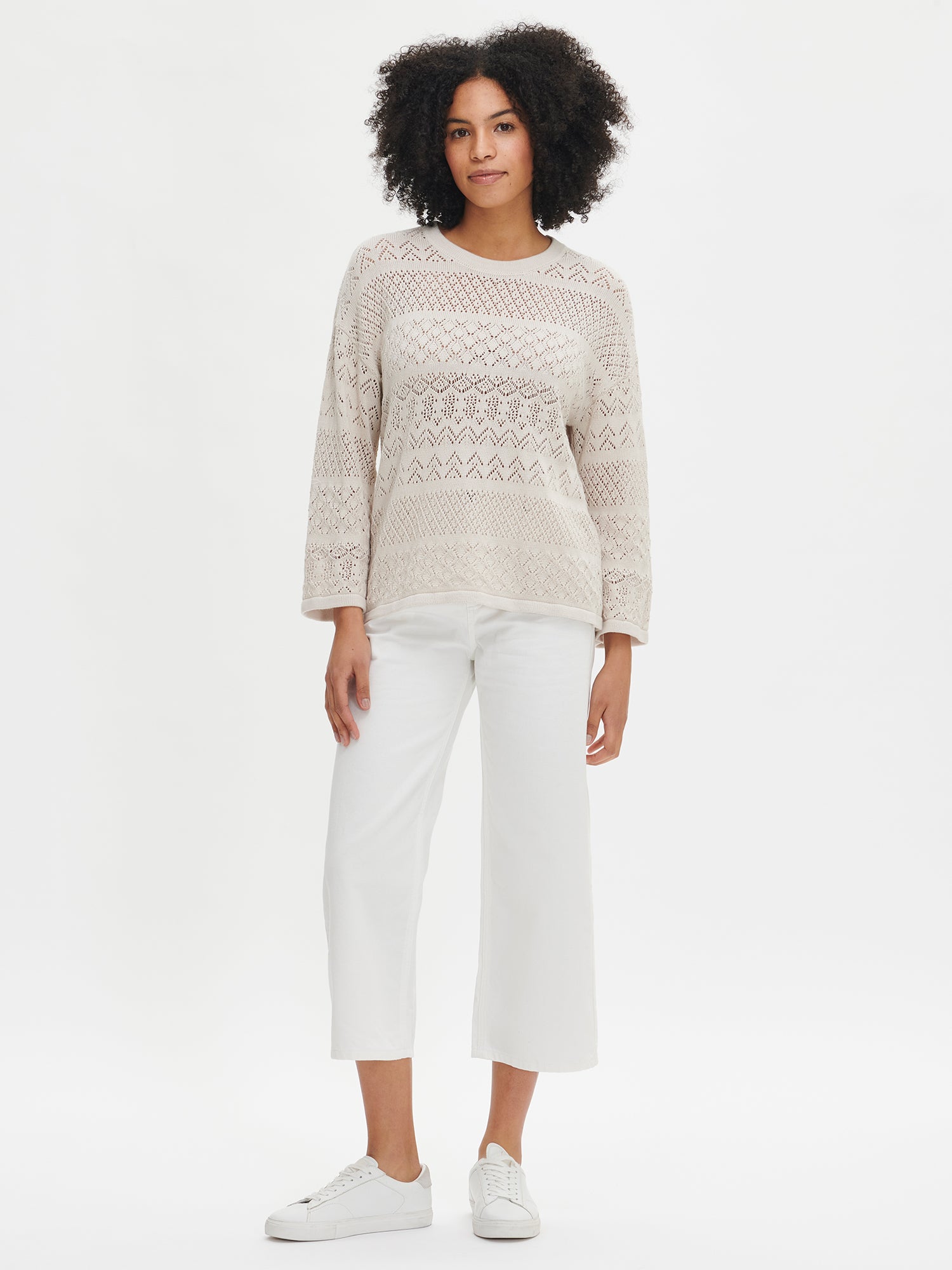 Nanso's Palermo knit sweater for women in classic beige with white jeans