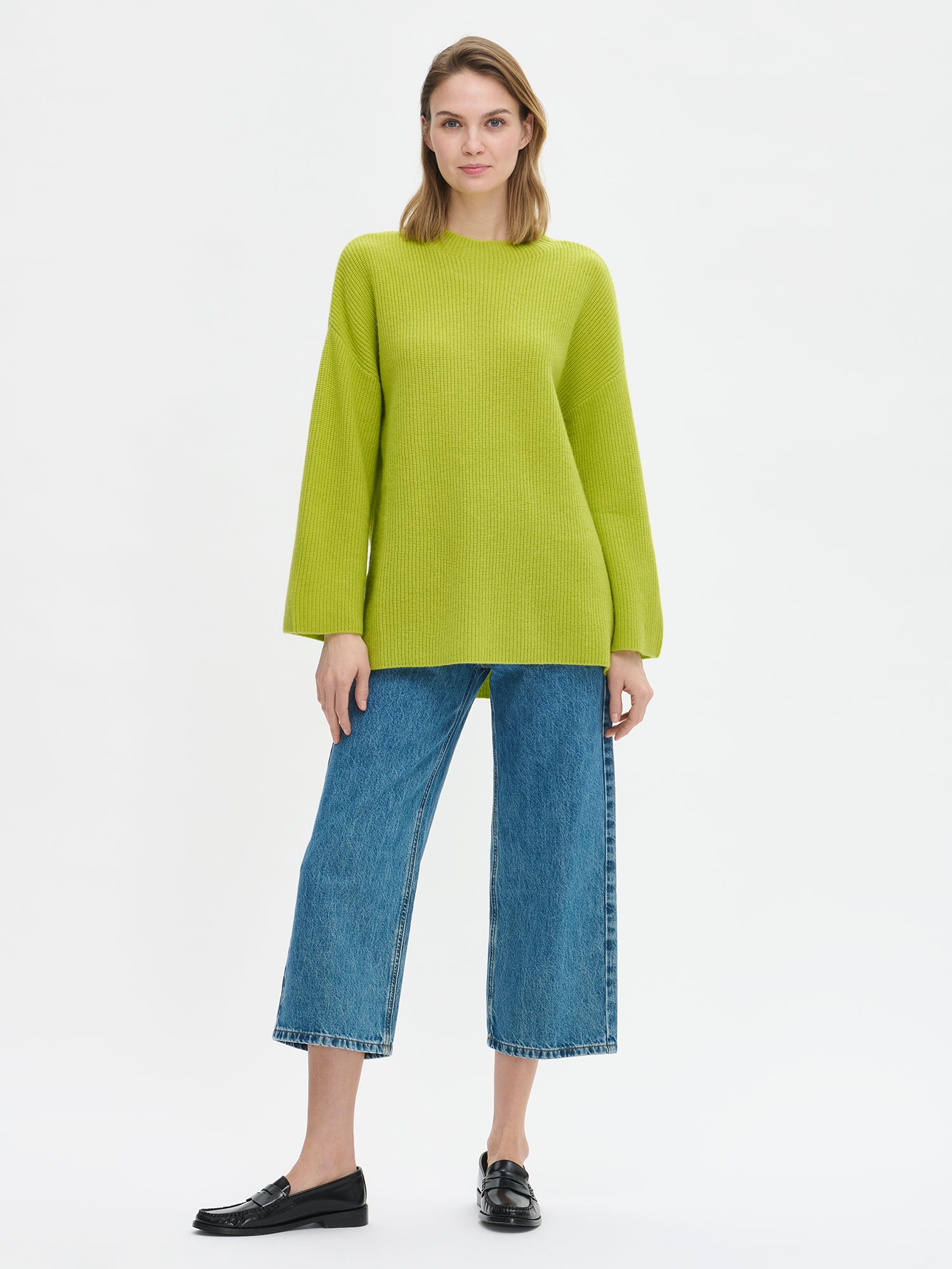 Nanso's relaxed green Pamela knit tunic from the front