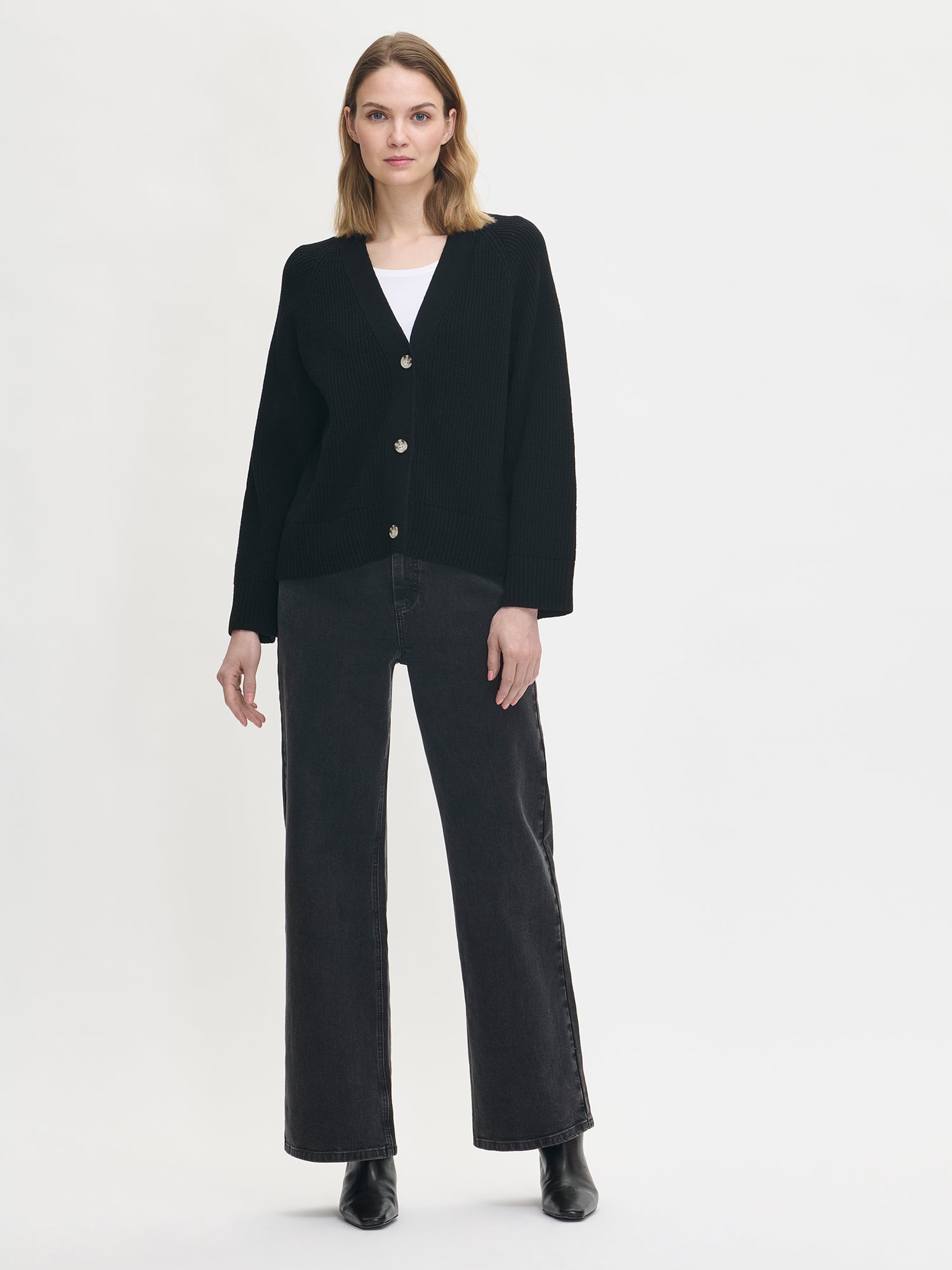 Nanso women's black Pamela knit cardigan with jeans