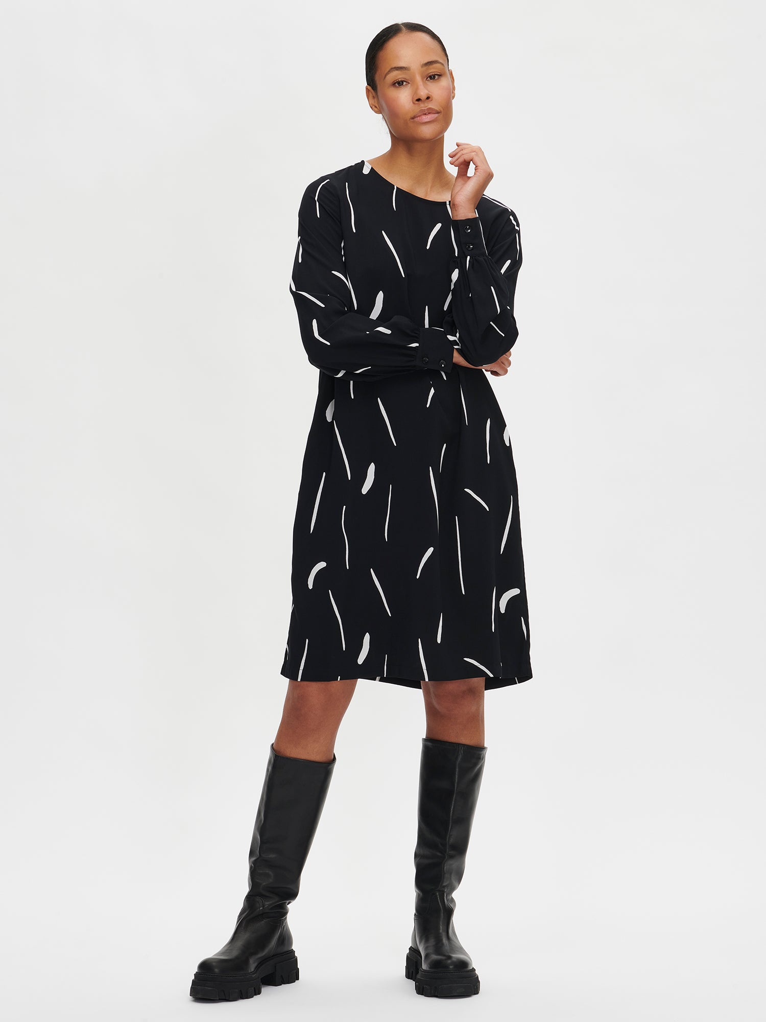 Nanso women's black and white patterned long-sleeved Sivellin mini dress on a model.