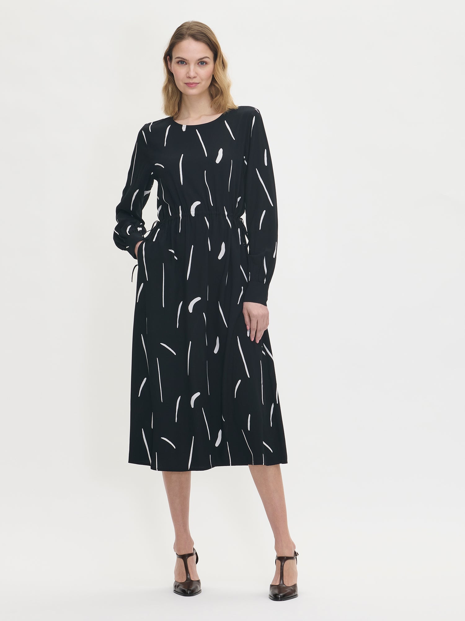 Nanso women's long-sleeved Sivellin midi dress features a black and white pattern, on a model