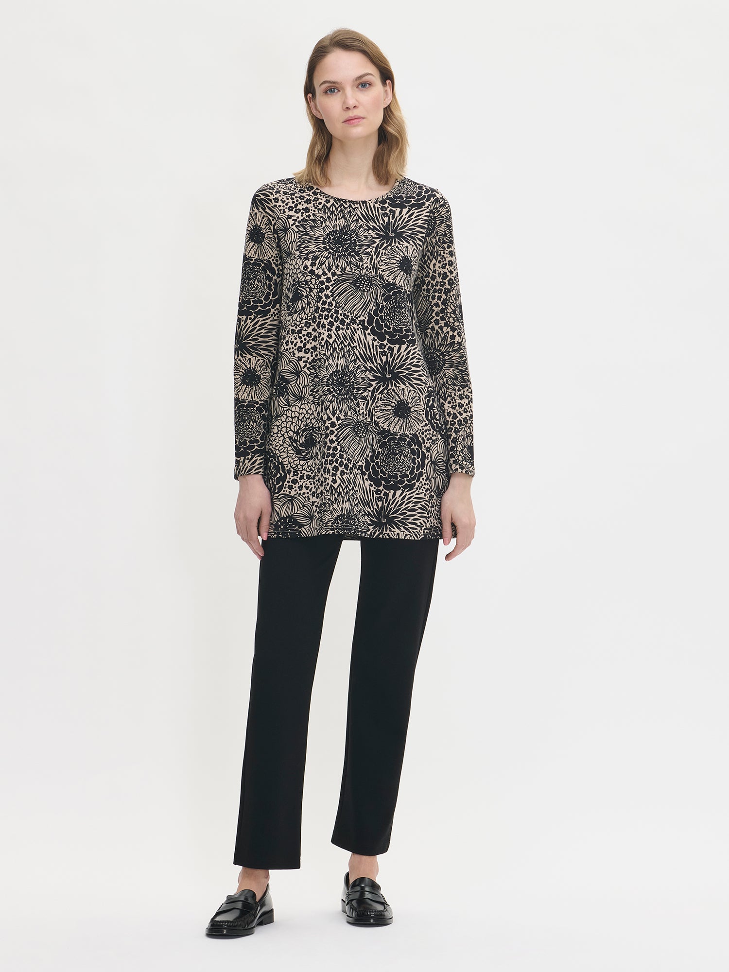 Nanso women's printed floral beige Huvi A-line tunic with a round neckline, on a model
