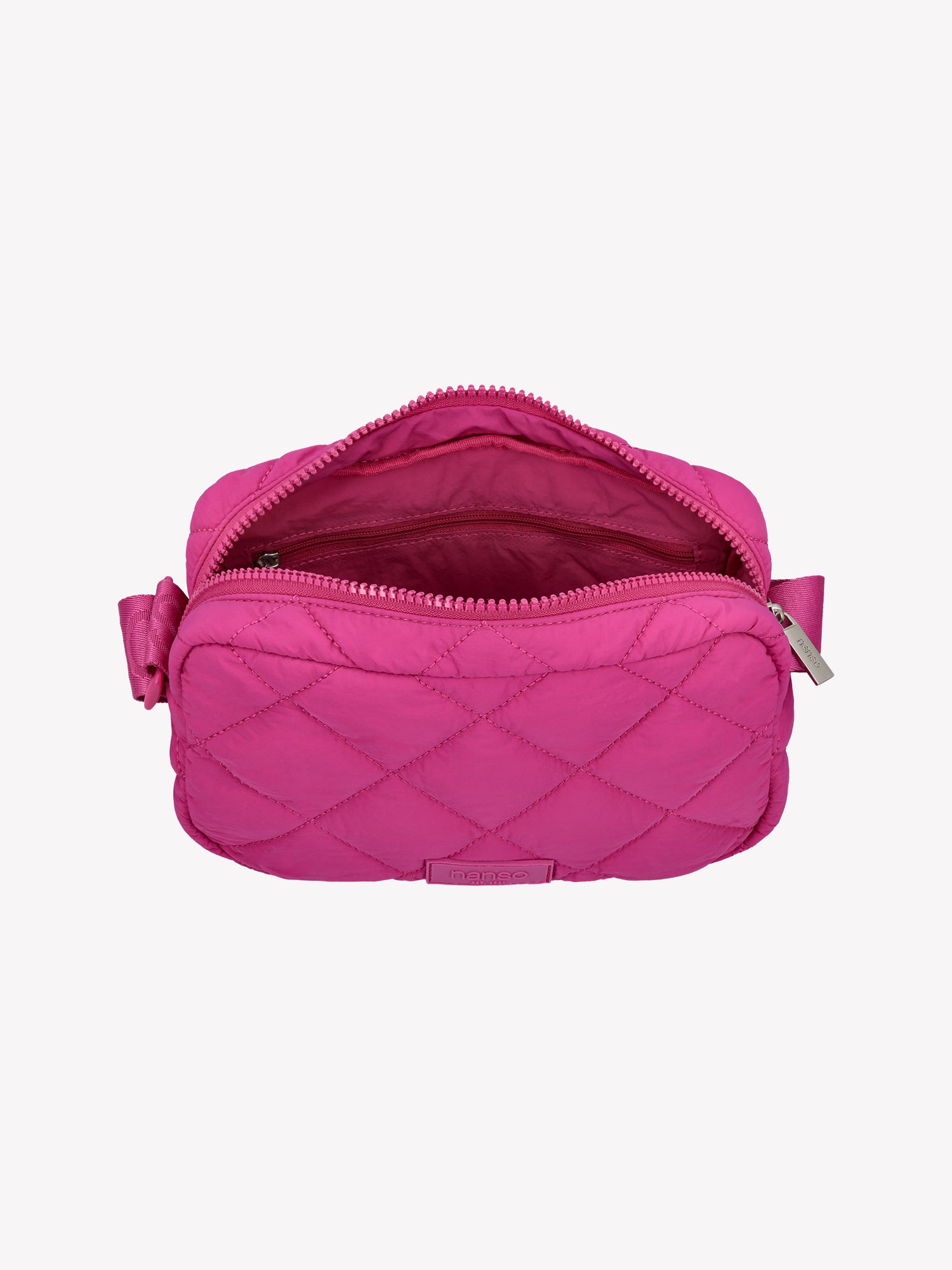 Nanso's stylish Vanu bag in pink features quilted fabric and an adjustable shoulder strap, open