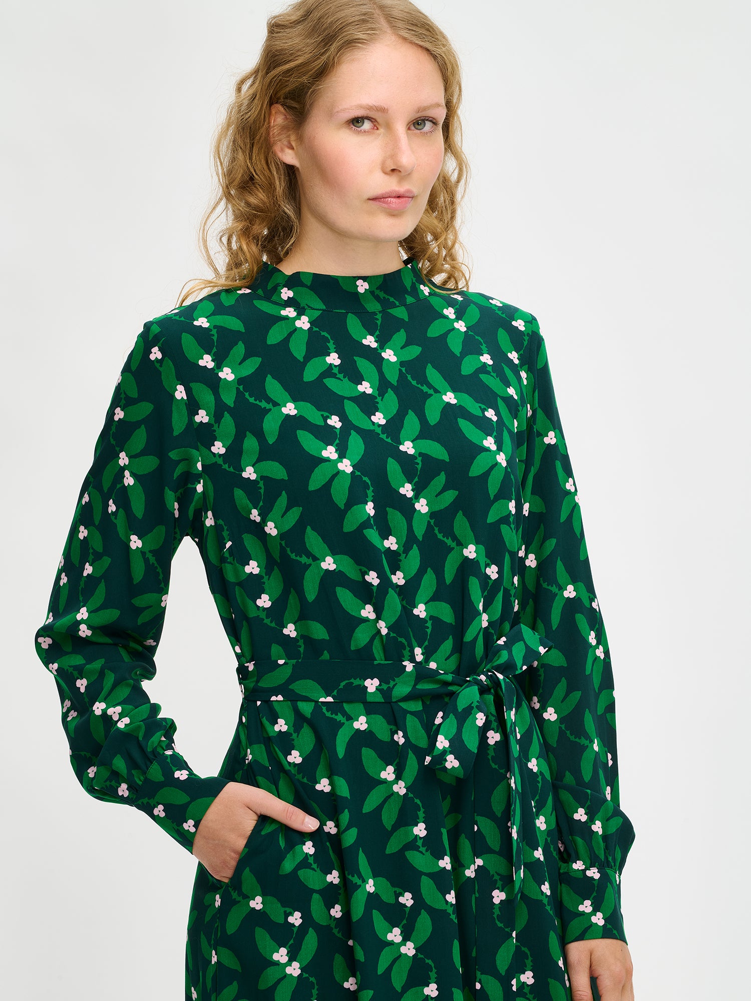 Nanso women’s Vieno dress in green floral viscose, close-up