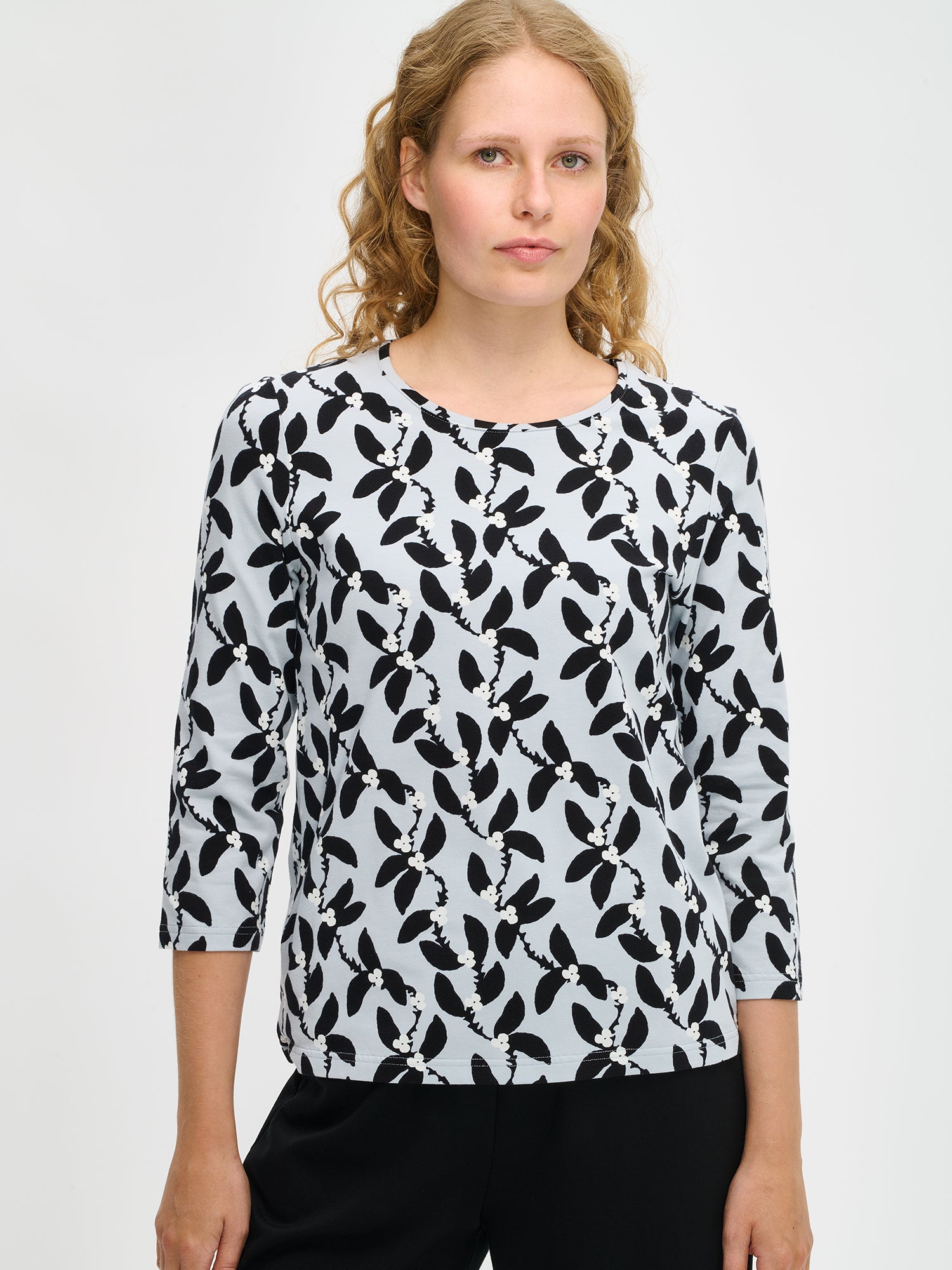 Nanso women’s Vieno blouse in grey floral cotton jersey, close-up