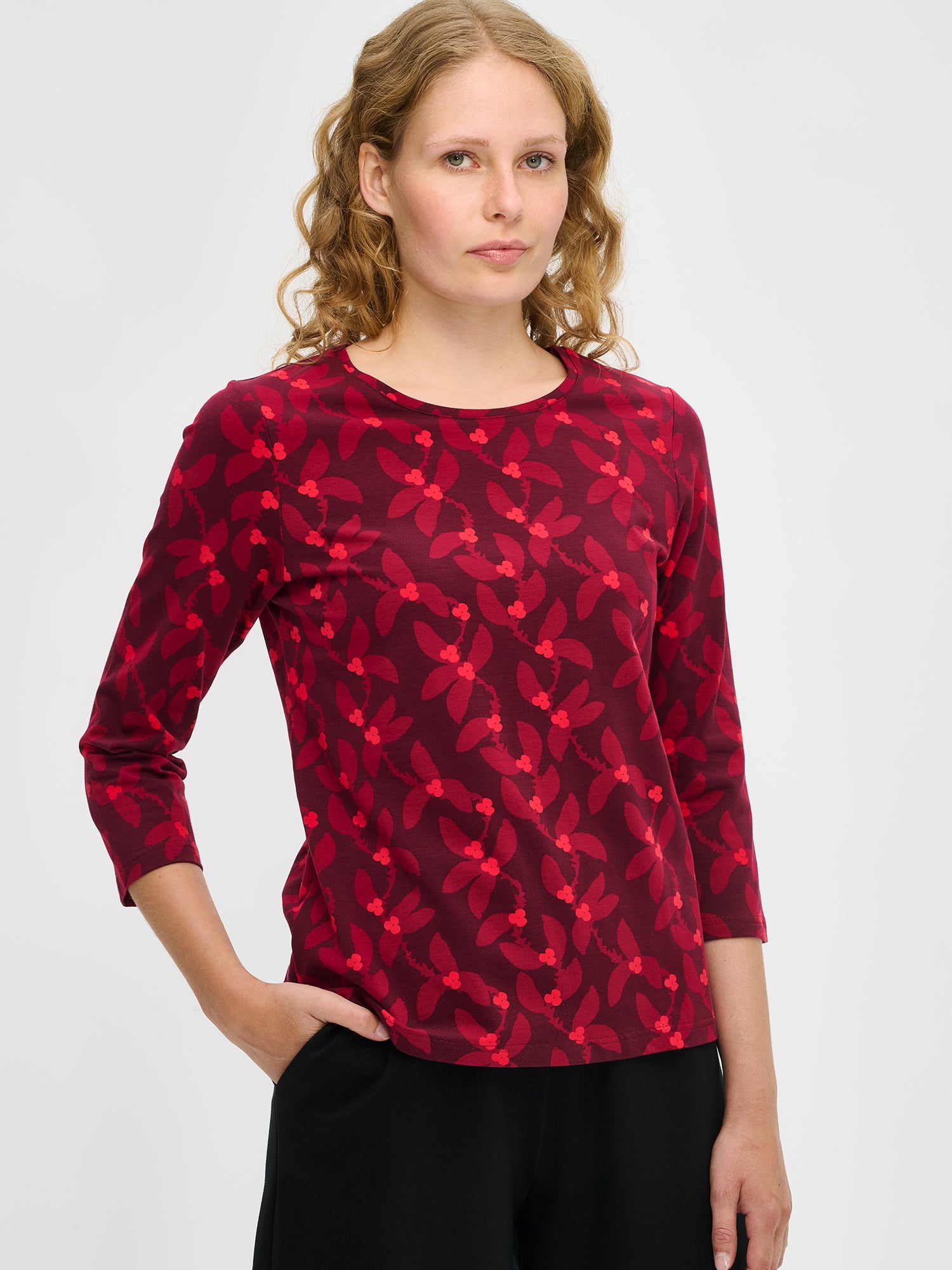 Nanso women’s Vieno blouse in red floral cotton jersey, close-up