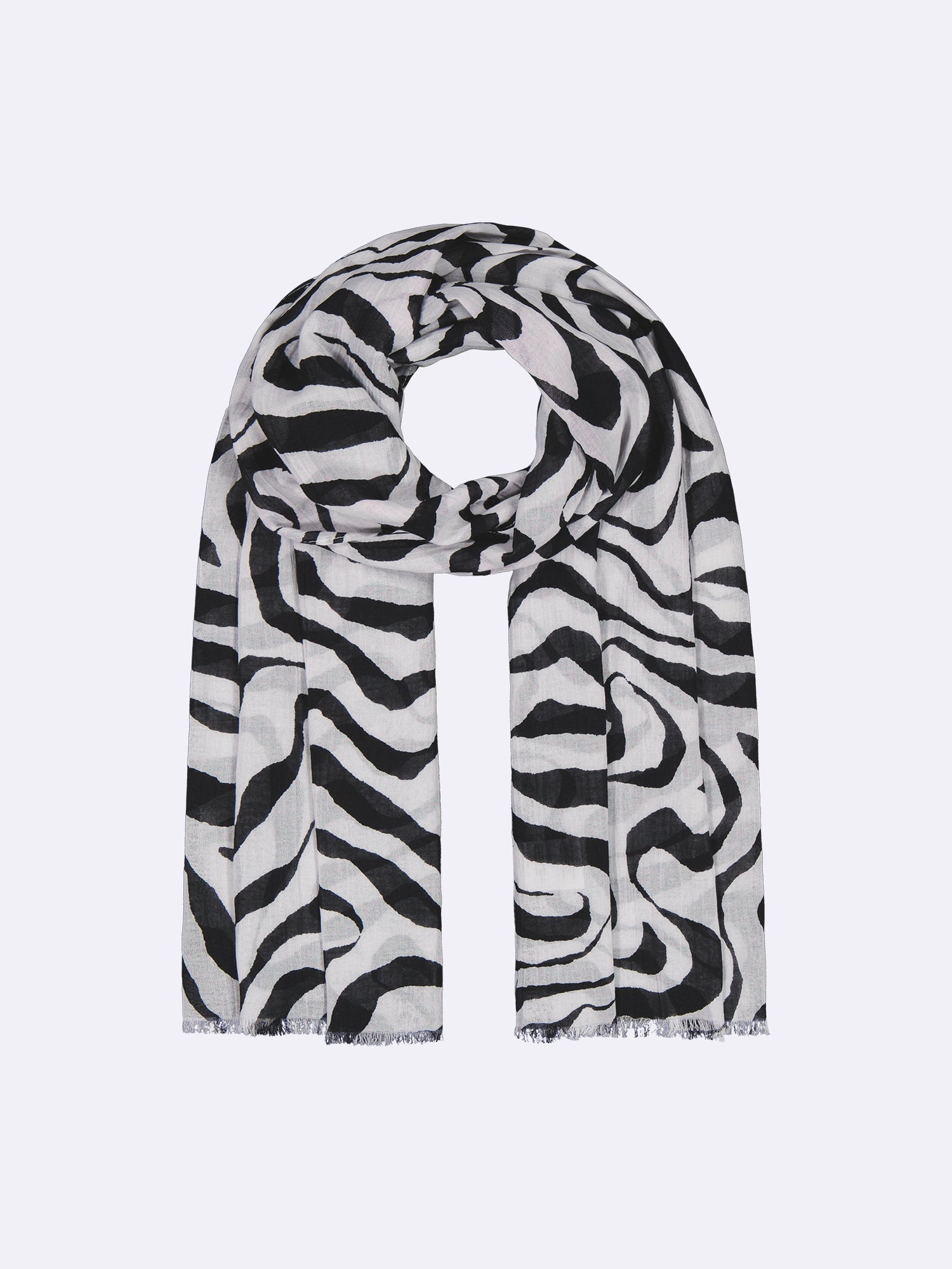 This Nanso's Savanna patterned scarf for ladies is made of thin and lightweight cotton-linen fabric. A must-have accessory to enhance your style. Displayed in product picture as a flat-lay.