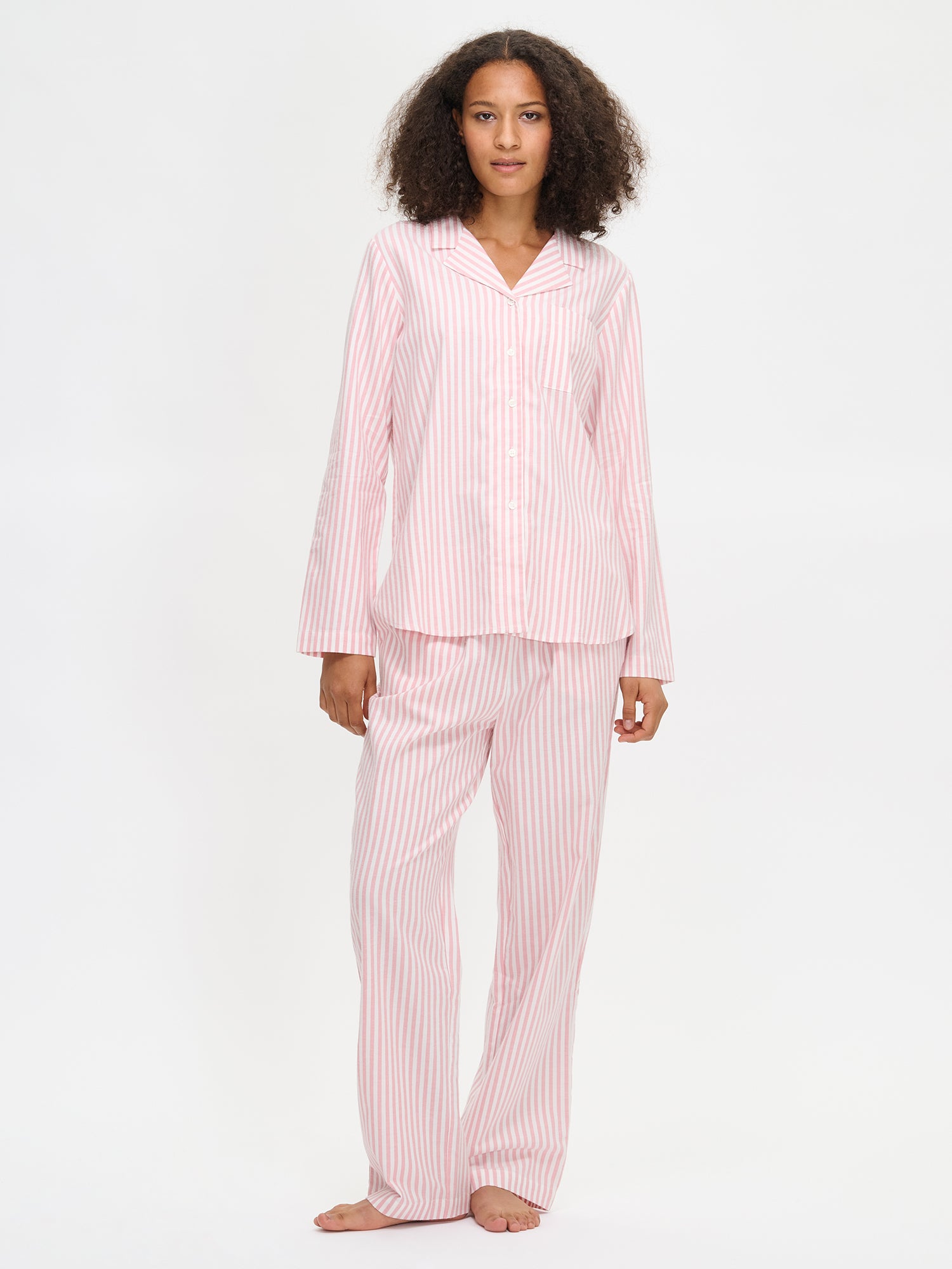 Nanso Polka pink women’s long-sleeved flannel shirt with collar and striped pattern, worn by model.