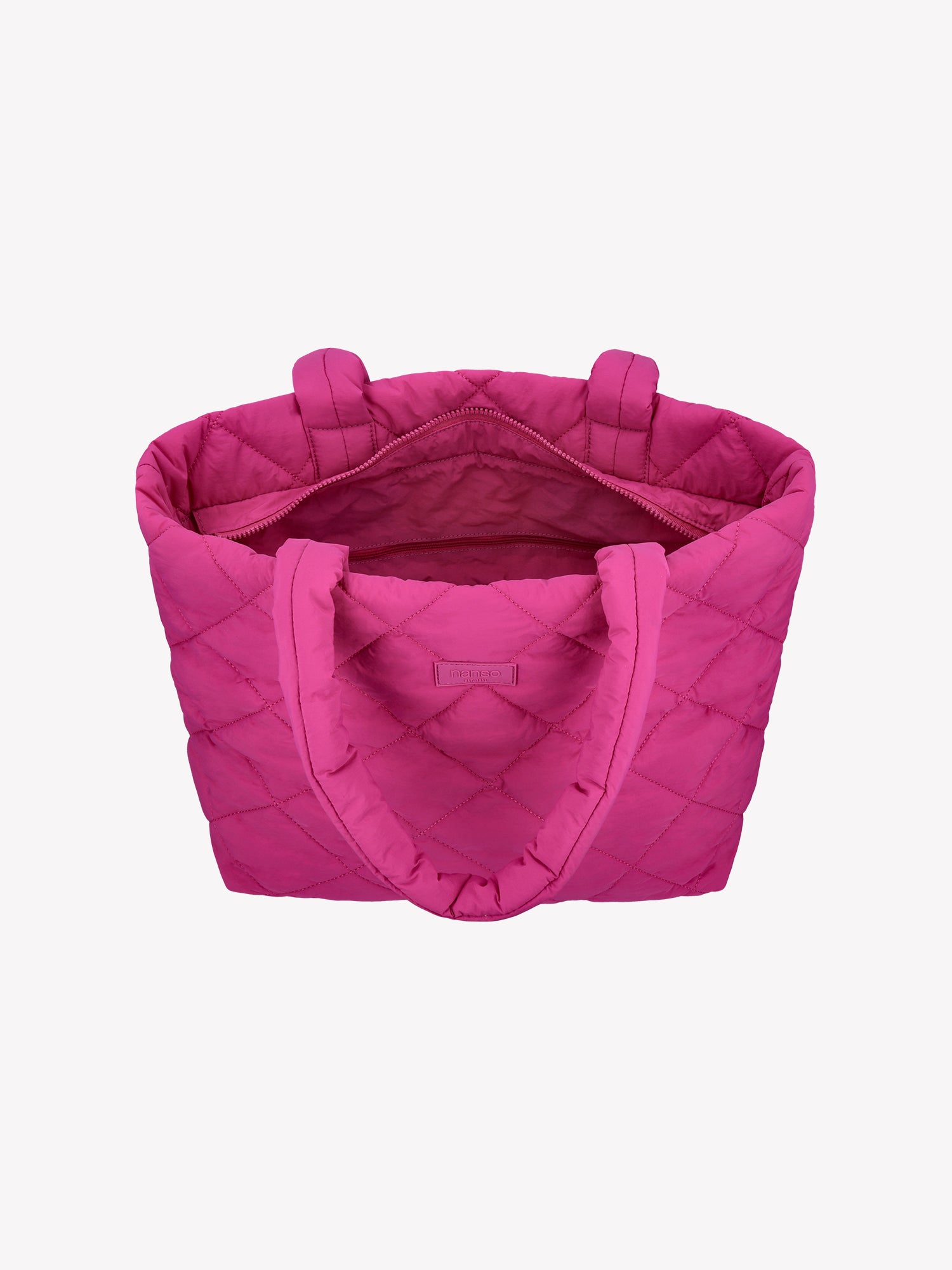 Nanso's trendy pink Maxi Vanu tote bag is crafted from quilted fabric, open