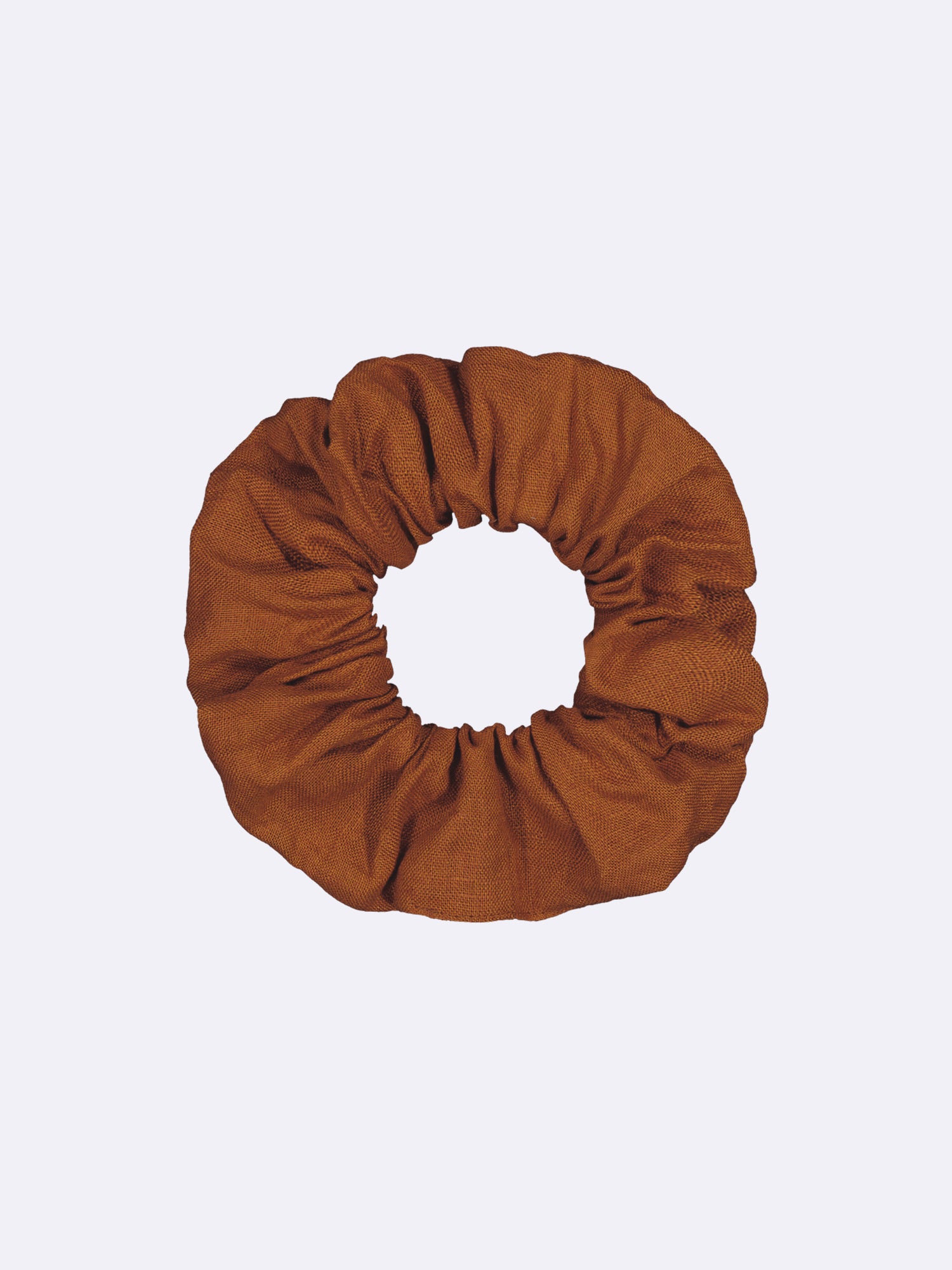 This elegant and timeless beige linen hair tie, made from surplus material, showcases a beautiful combination of style and sustainability.