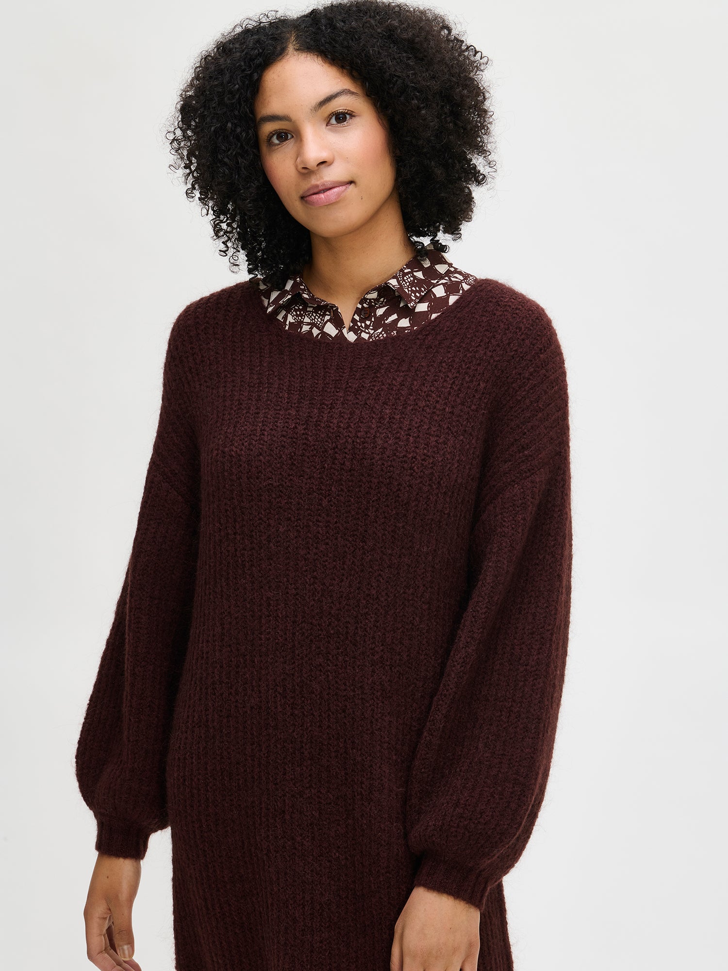Nanso's luxurious dark brown Karamelli knit dress, close-up