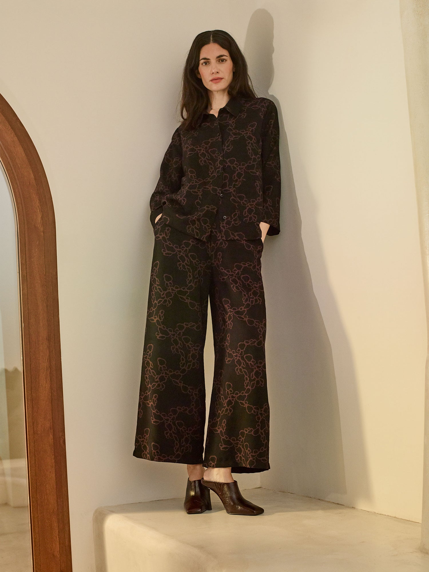 Nanso womens stylish patterned KIDE trousers and shirt for women featuring slightly cropped wide legs, on a model with high heel shoes