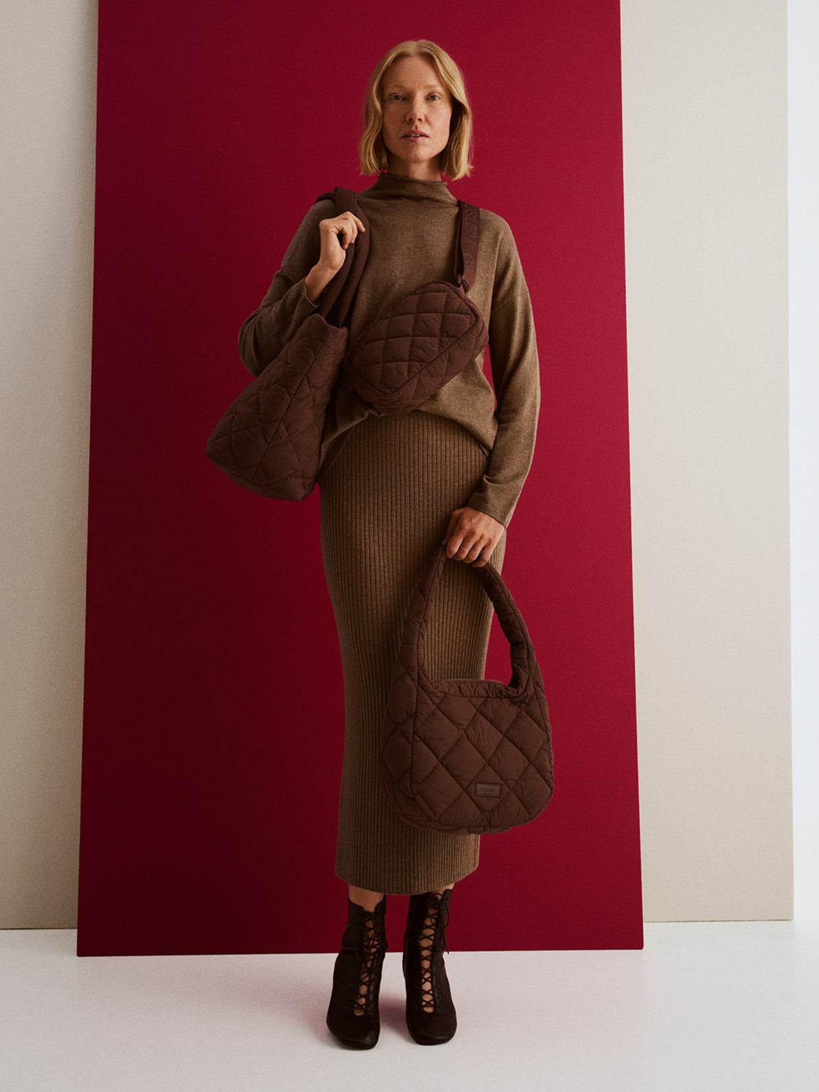 Nanso women's brown vanu bags, carried by a model.