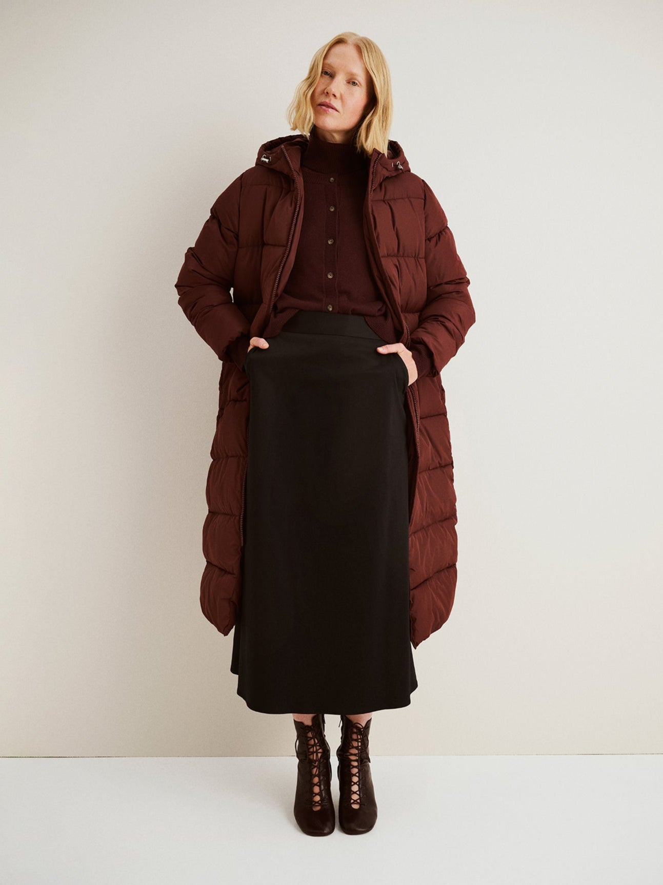 The women's Milla black skirt. Worn by a model.