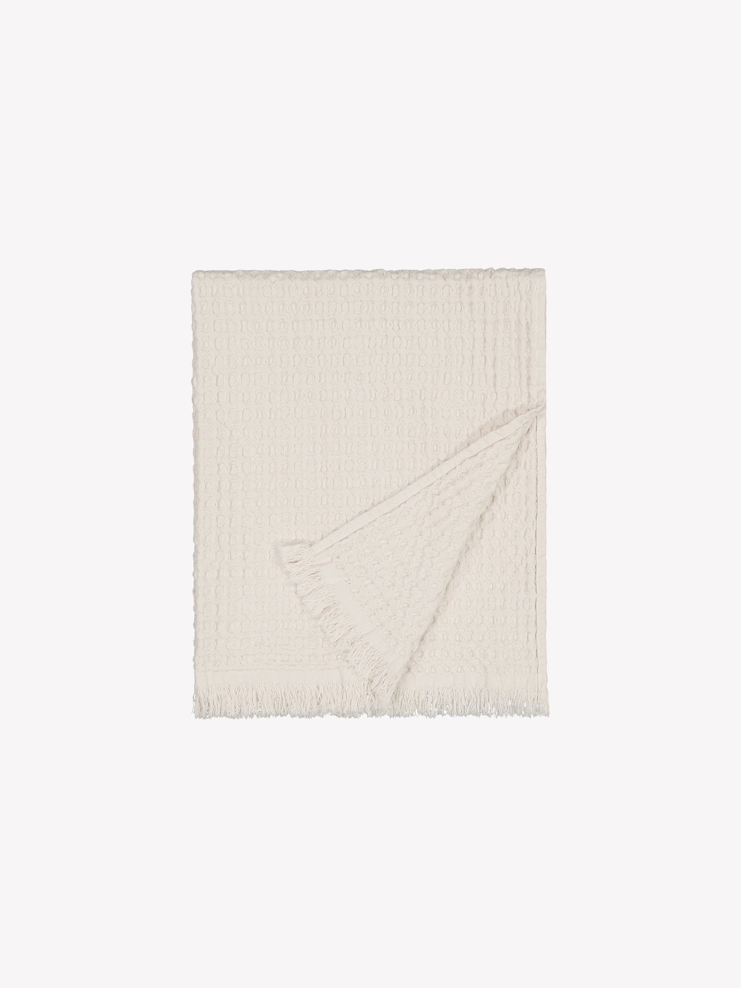 Vohveli hand towel in beautiful beige folded