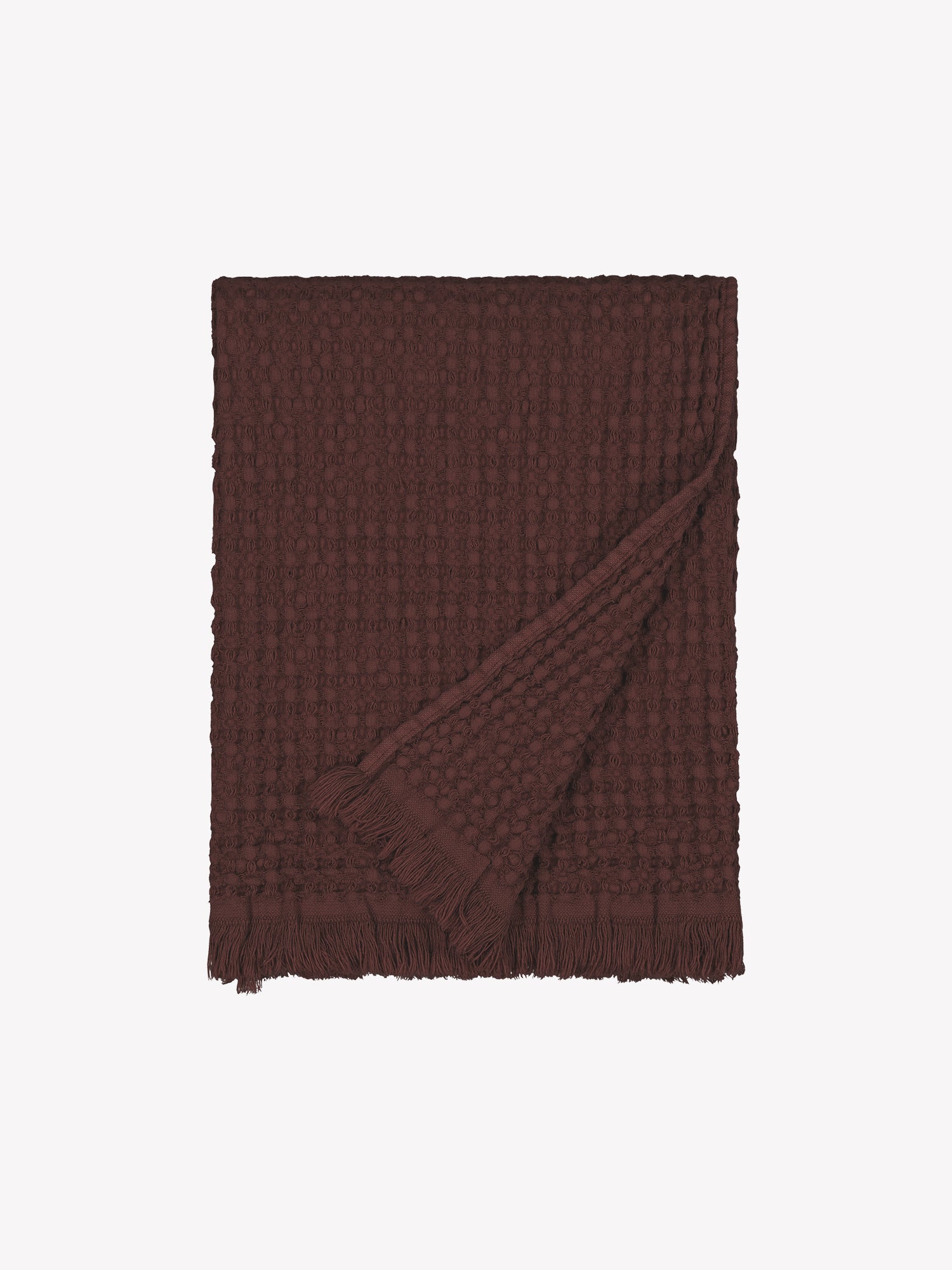 Nanso home's Vohveli Bath towel in brown folded