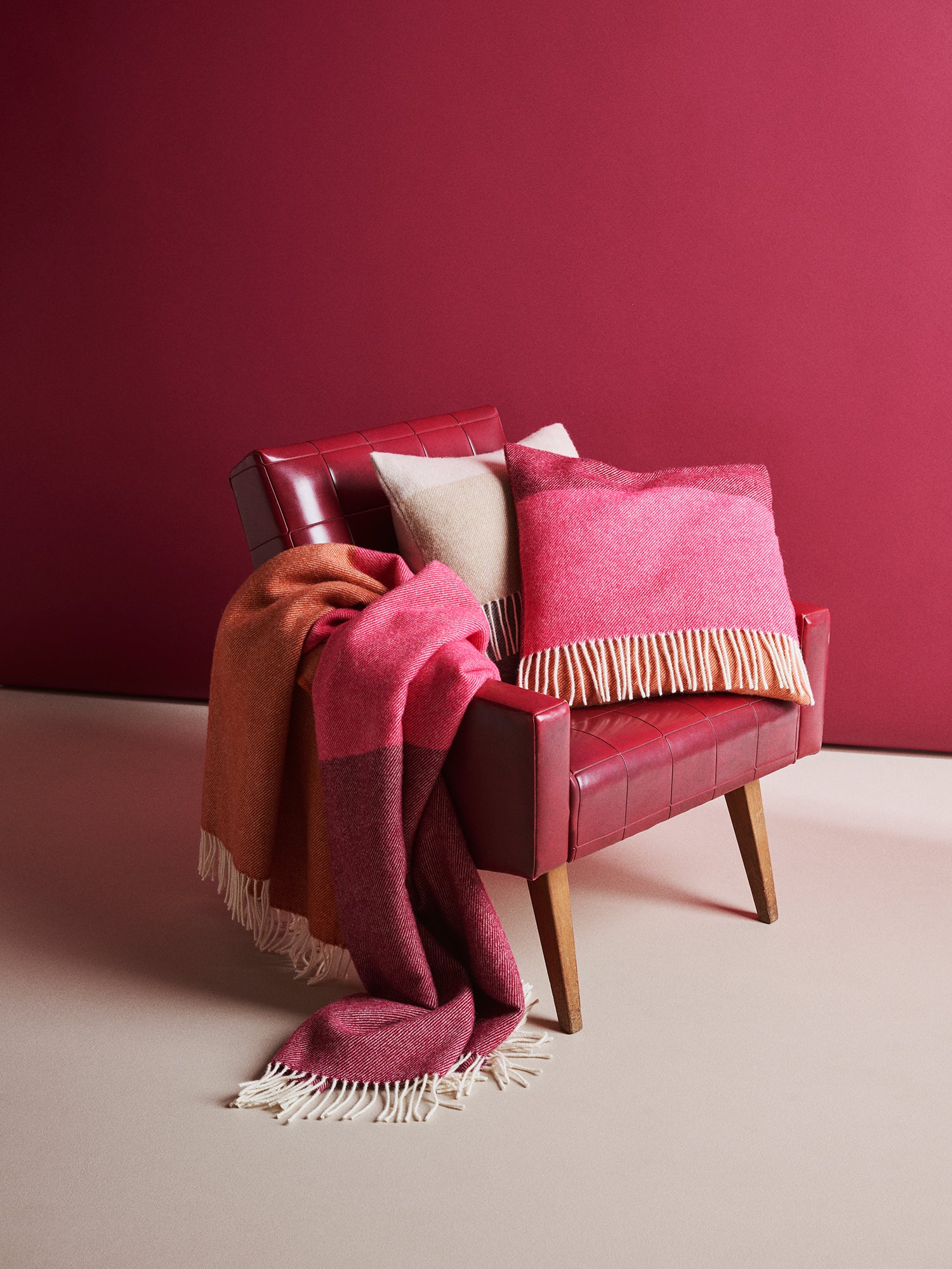 Nanso's Trio wool blanket made from 100% pure new wool. This blanket features a beautiful red striped pattern.