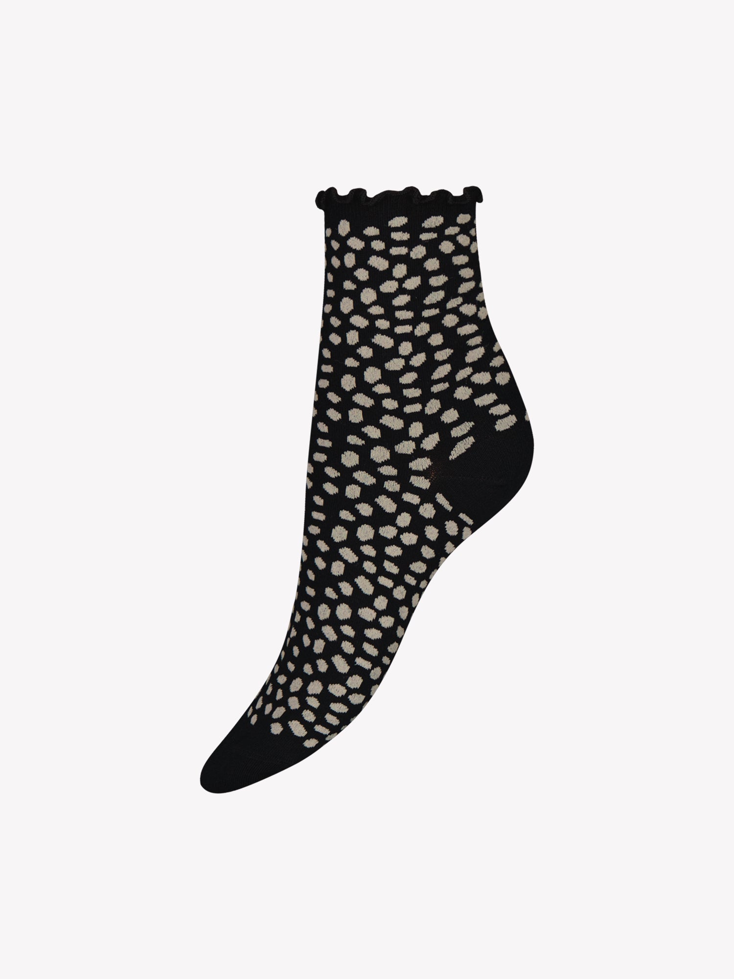Soft organic cotton ankle socks in a convenient two-pair set. One pair features a charming dot pattern while the other is in classic black, both finished with delicate ruffle detailing for everyday comfort and style. Product picture of the dotted sock
