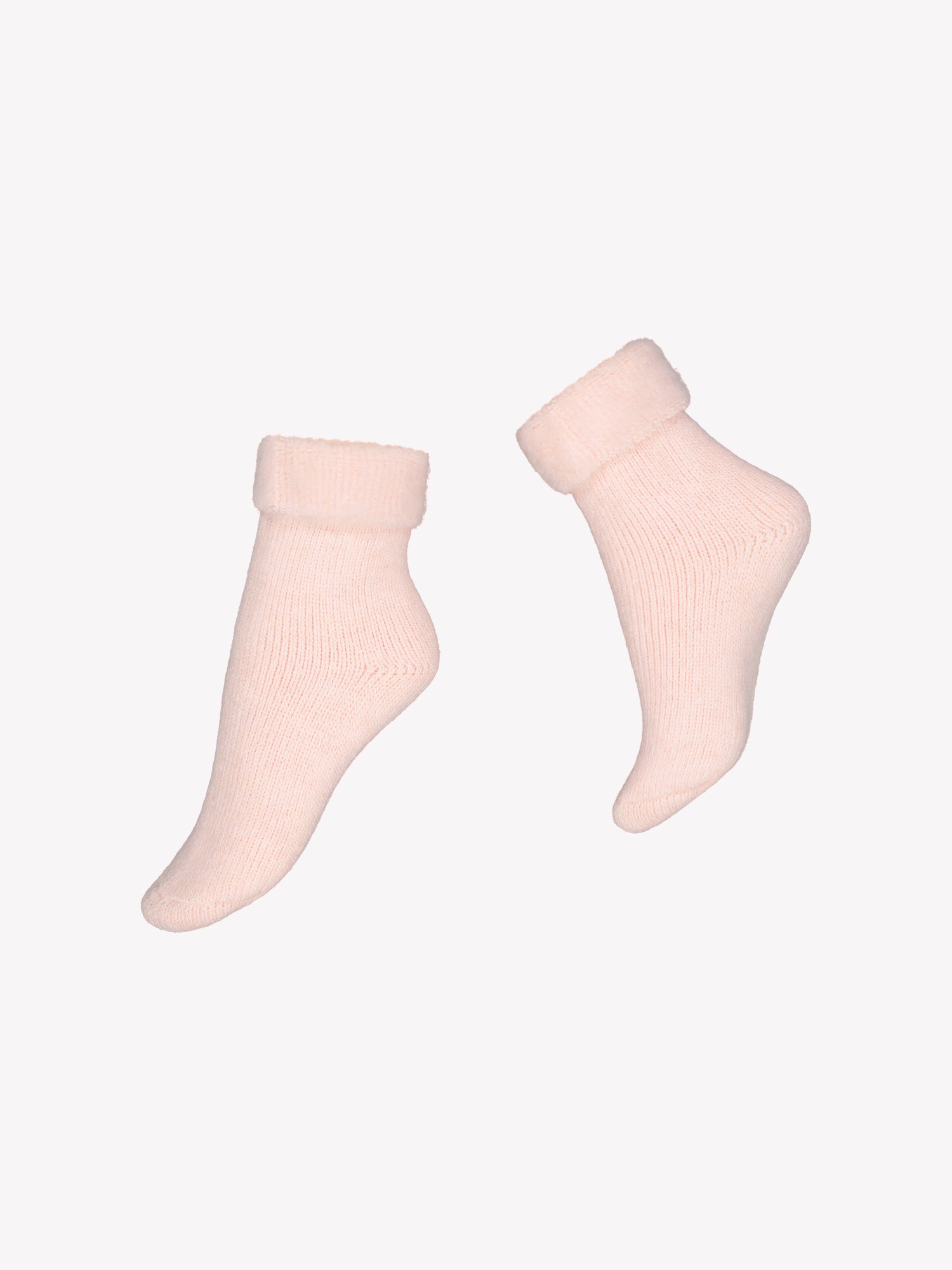 Beautifully soft pale pink alpaca blend ankle socks from Vogue. Product picture