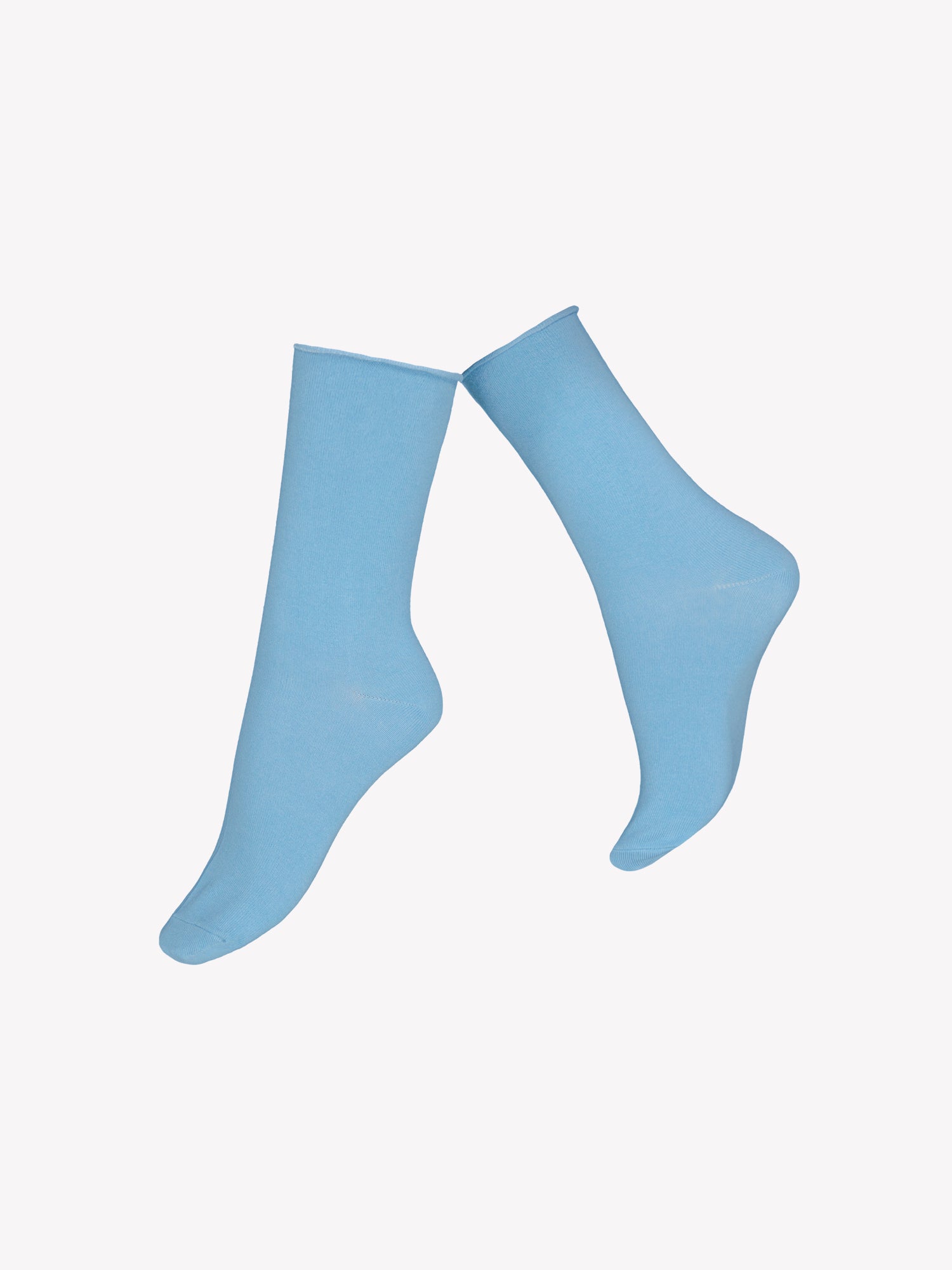 Vogue's soft, high-quality pastel blue ankle socks made of organic cotton. For every two pairs purchased one will receive one free pair of socks. 