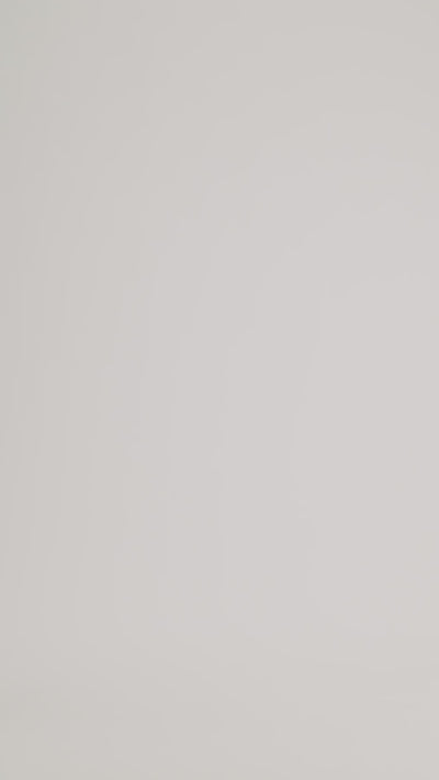 Nanso women's relaxed short MIMI jacket in a beautiful blue shade on a model with patterned outfit